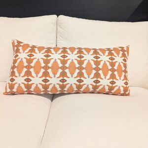 Orange and White Patterned Throw Pillow